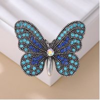 XSB251 - Elegant Diamond-Encrusted Butterfly Brooch